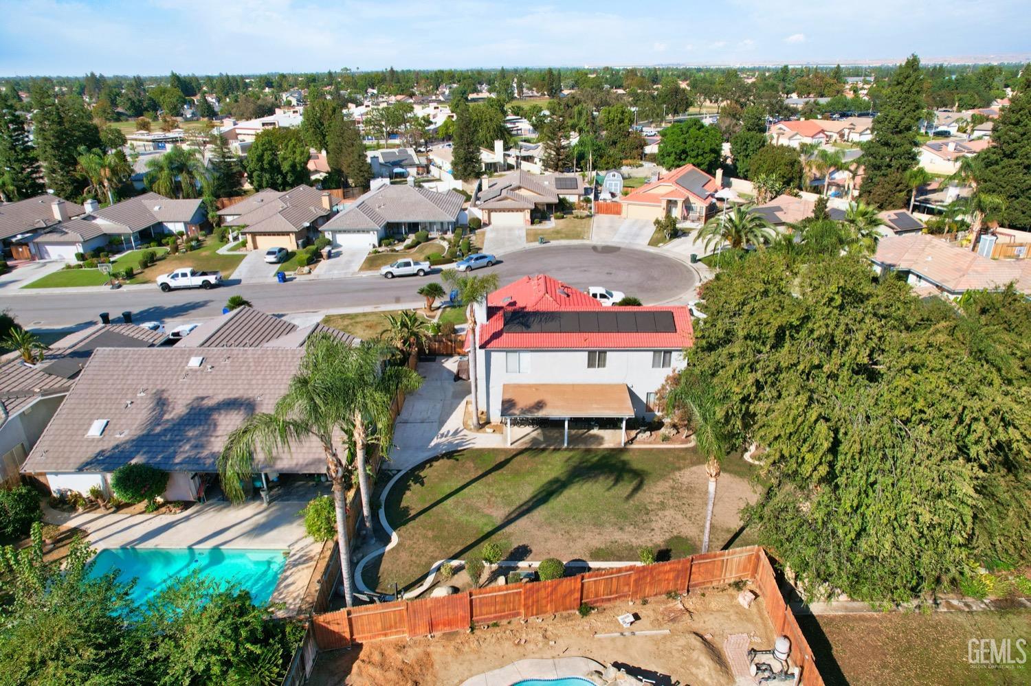 Undisclosed Address Bakersfield, CA 93312 - Photo 26 of 29 an aerial view of a houses with a swimming pool