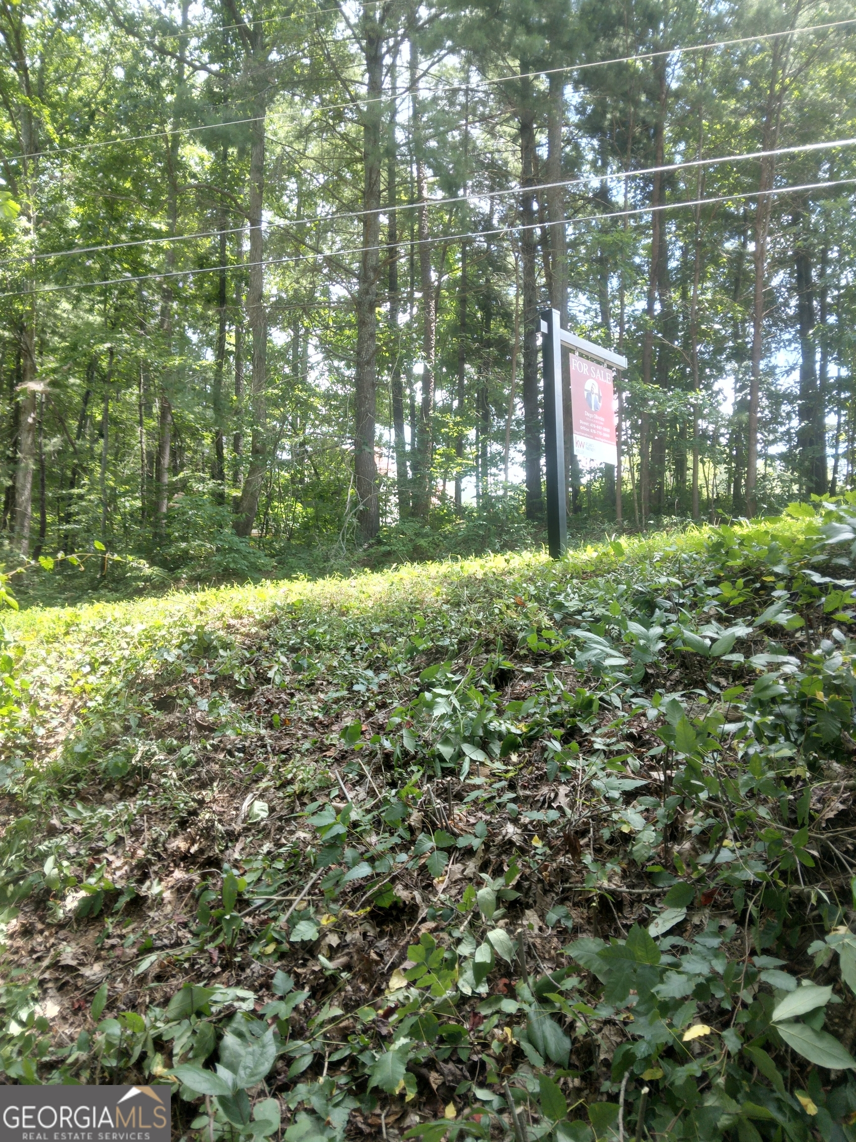 a view of a street with a building