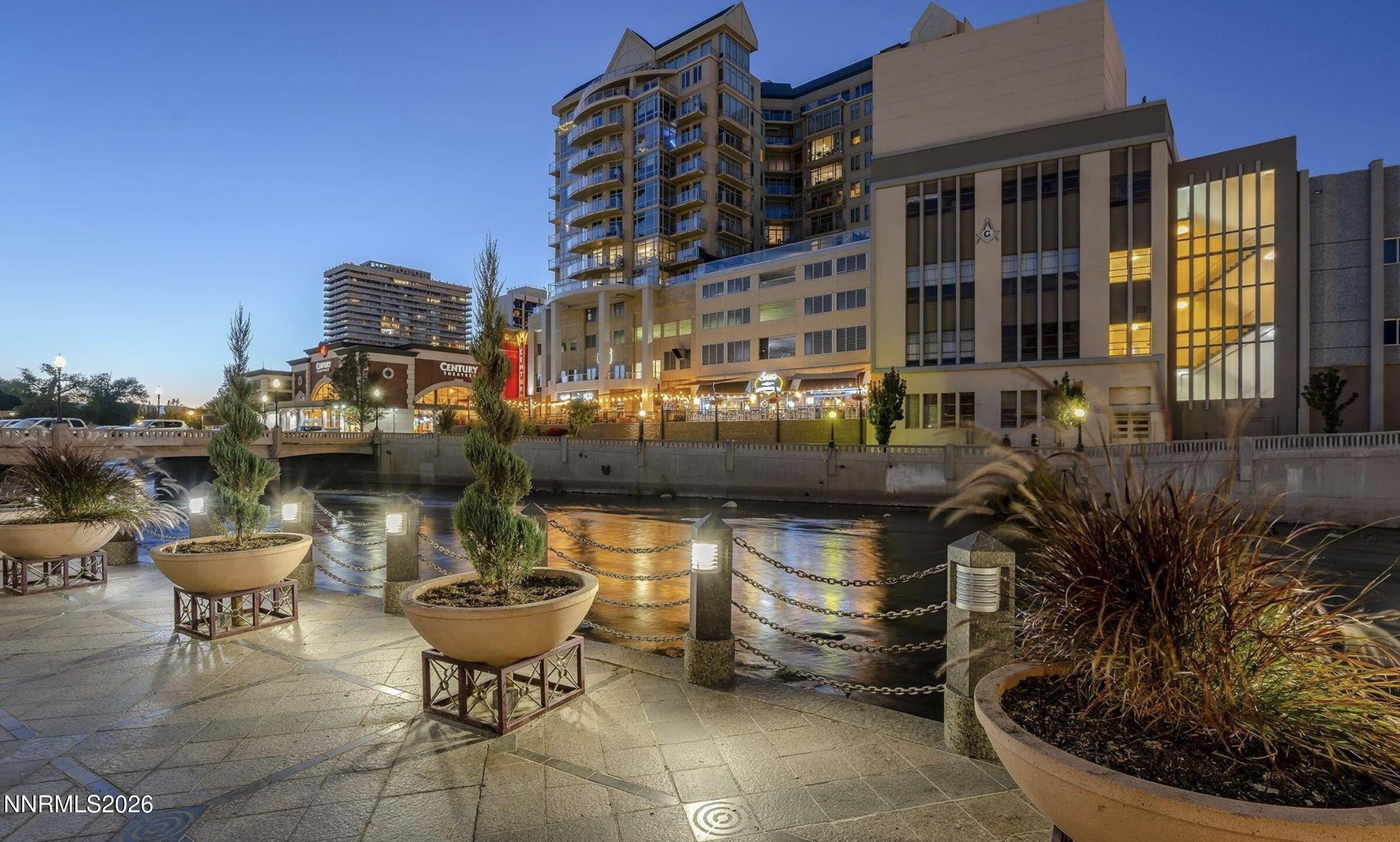 50 North Sierra Street, Unit STE 905 Reno, NV 89501 - Photo 2 of 12 a view of a lake with outdoor seating