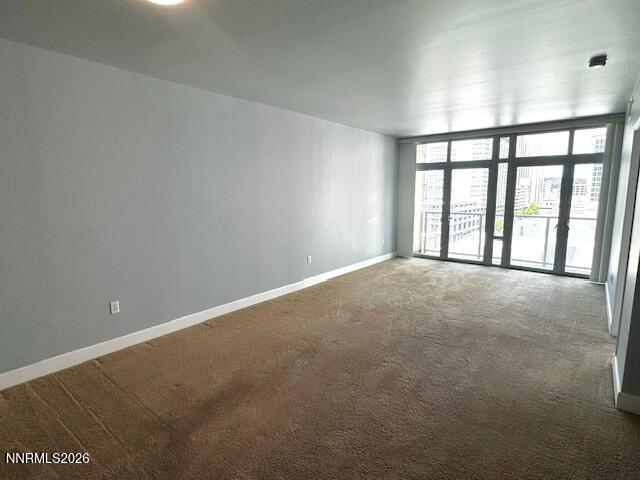 50 North Sierra Street, Unit STE 905 Reno, NV 89501 - Photo 4 of 12 a view of an empty room with a window
