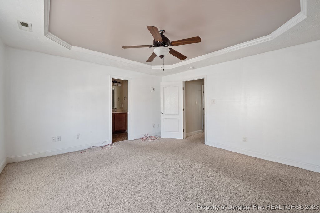 185 Sunflower Street Raeford, NC 28376 - Photo 20 of 30 a view of an empty room with a ceiling fan