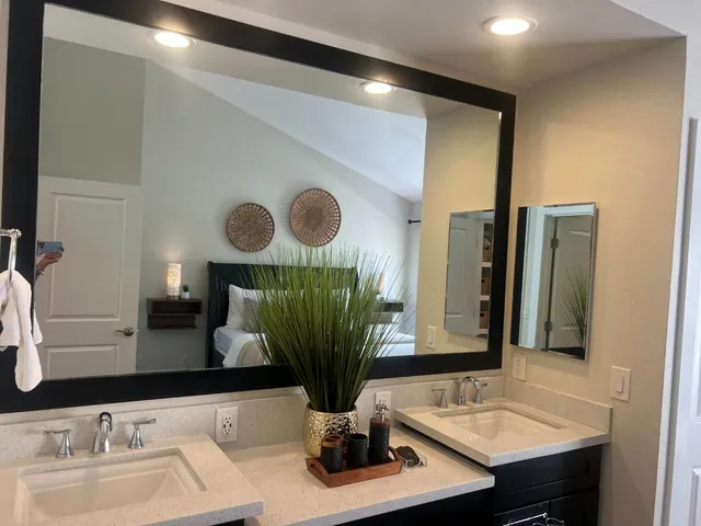 a bedroom with bed and a closet