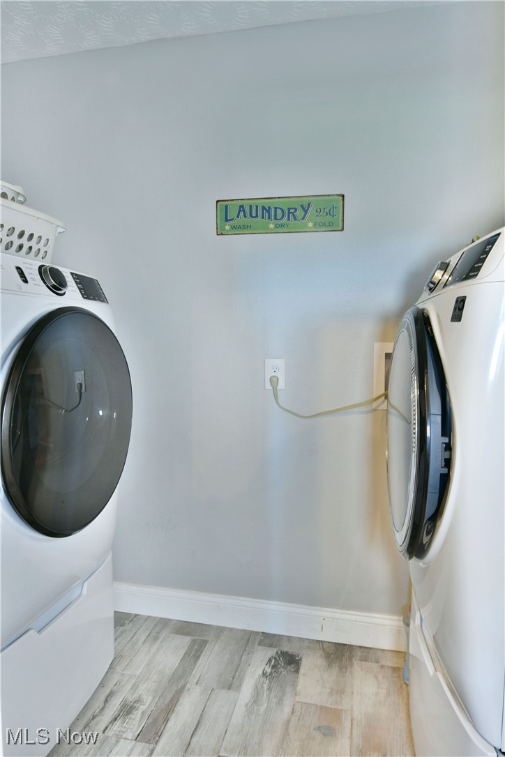 5558 Pierce Road Northwest Warren, OH 44481 - Photo 47 of 50 Laundry room featuring light wood-type flooring