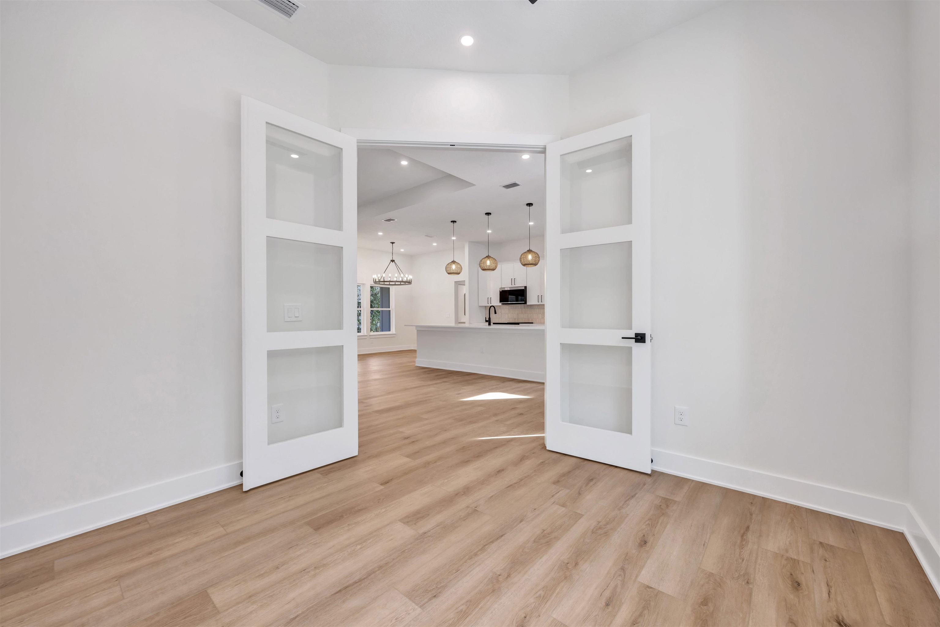 149 Dory Road St. Augustine South, FL 32086 - Photo 6 of 12 a view of empty room with wooden floor