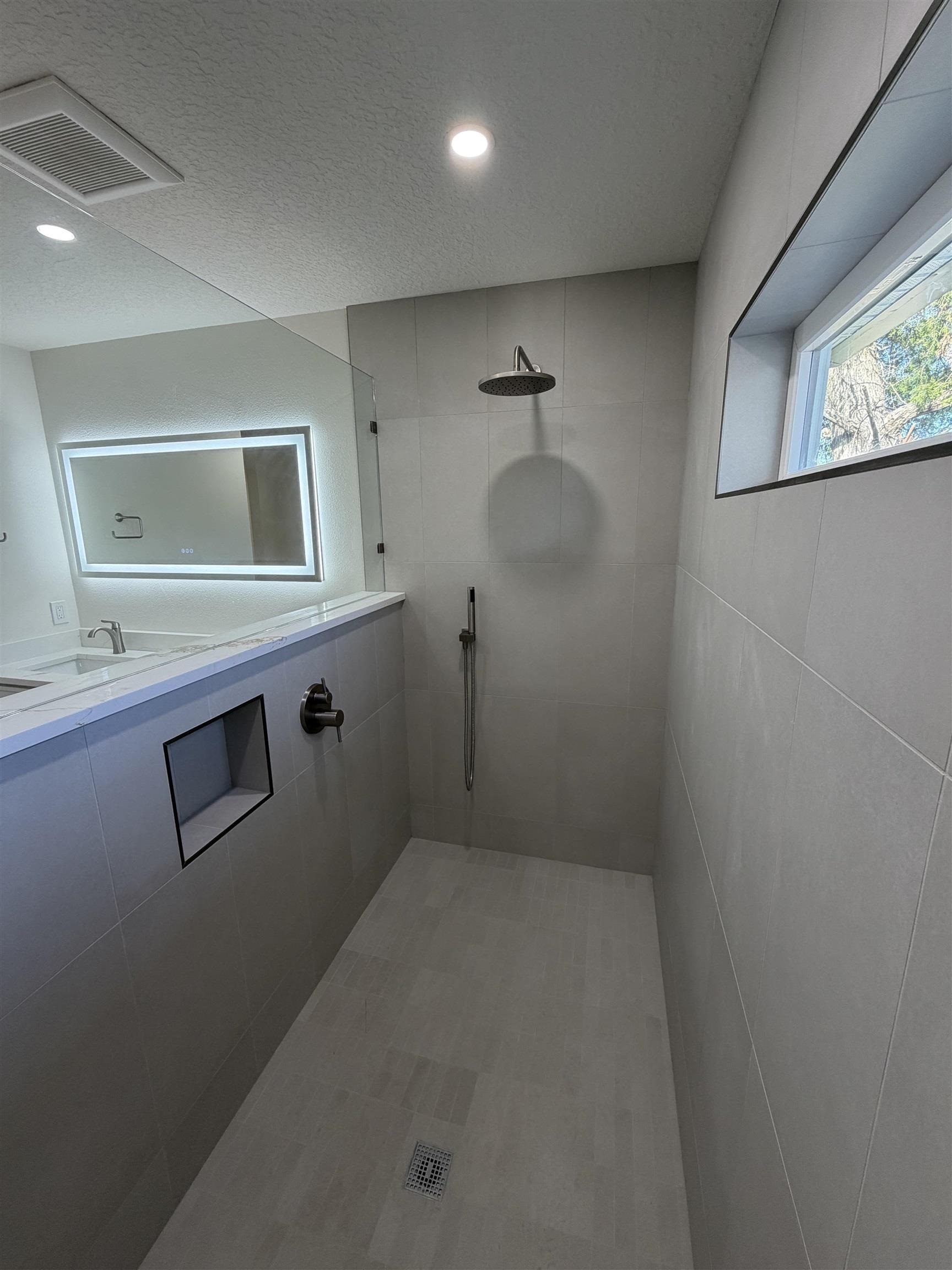 149 Dory Road St. Augustine South, FL 32086 - Photo 9 of 12 a room with a wooden floor and a large window