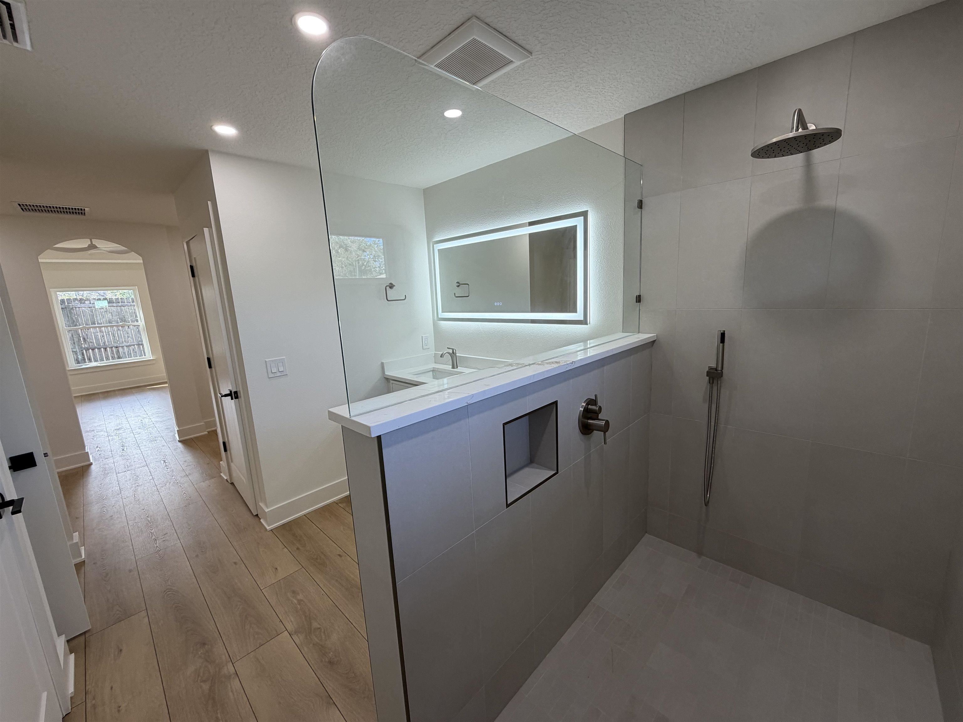 149 Dory Road St. Augustine South, FL 32086 - Photo 10 of 12 a kitchen with refrigerator cabinets and wooden floor