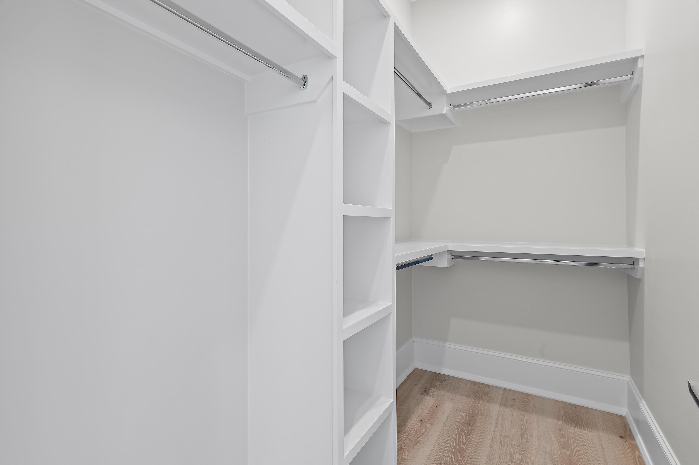 49 Sundew Pl Inlet Beach Inlet Beach, FL 32461 - Photo 78 of 108 a view of walk in closet with empty racks