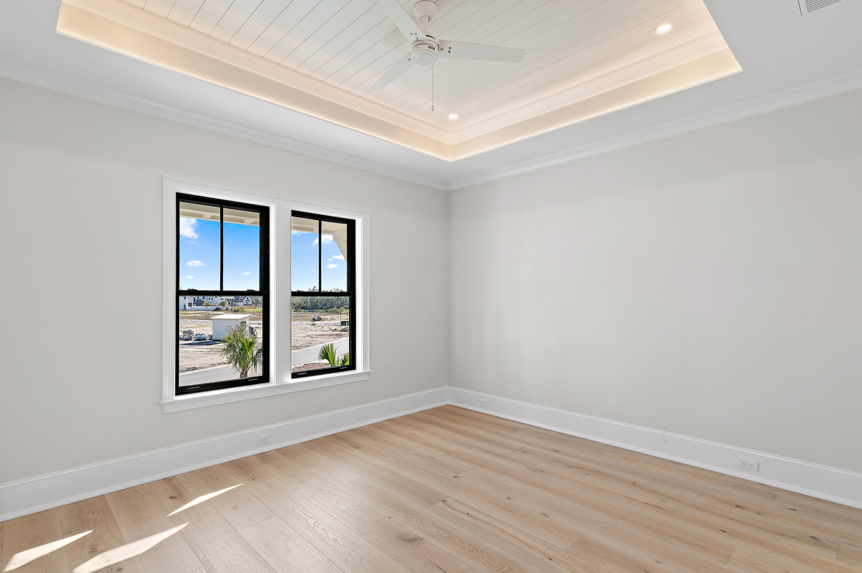 49 Sundew Pl Inlet Beach Inlet Beach, FL 32461 - Photo 79 of 108 an empty room with wooden floor and windows