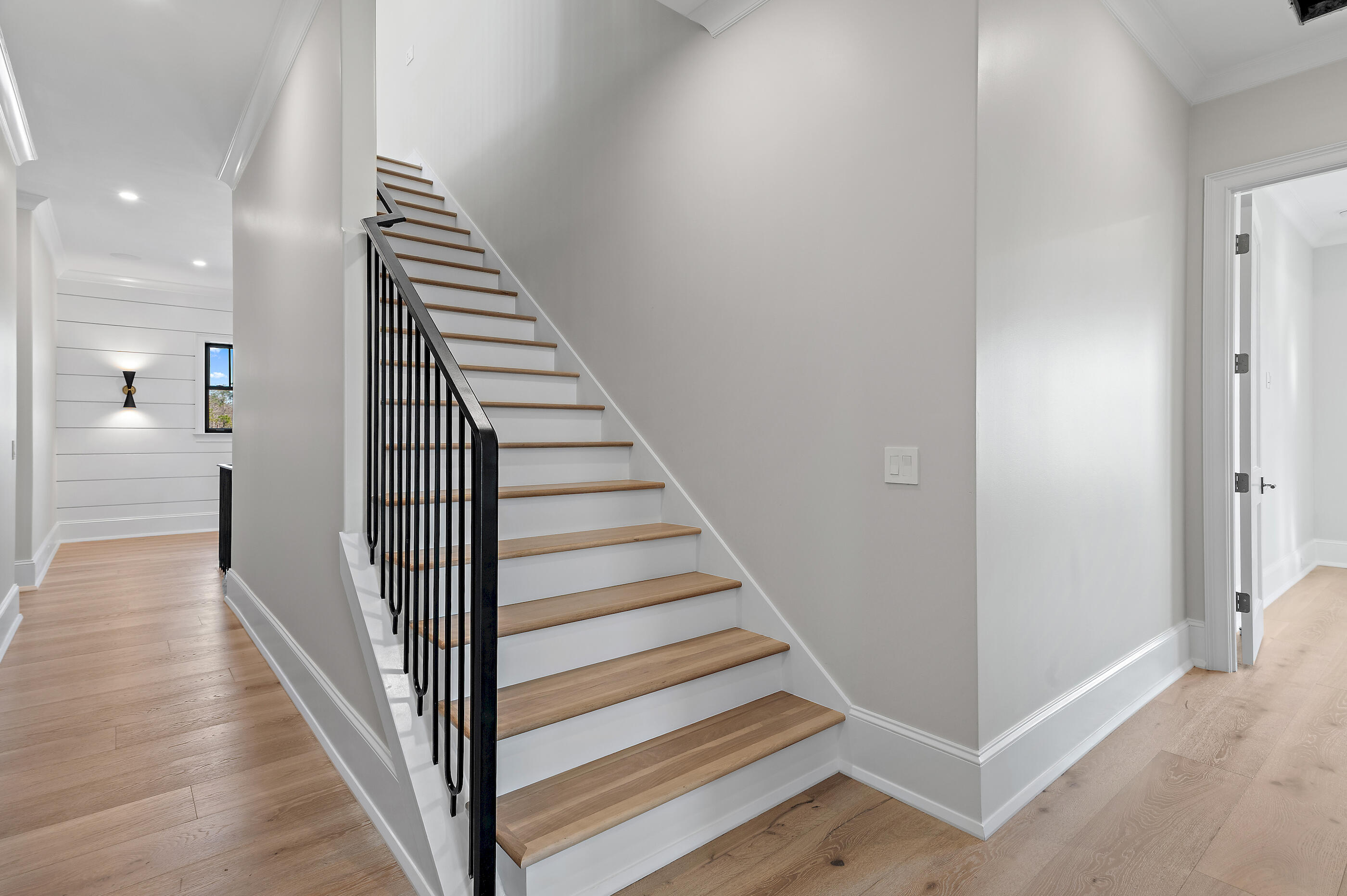 49 Sundew Pl Inlet Beach Inlet Beach, FL 32461 - Photo 90 of 108 a view of a hallway with wooden floor and entryway