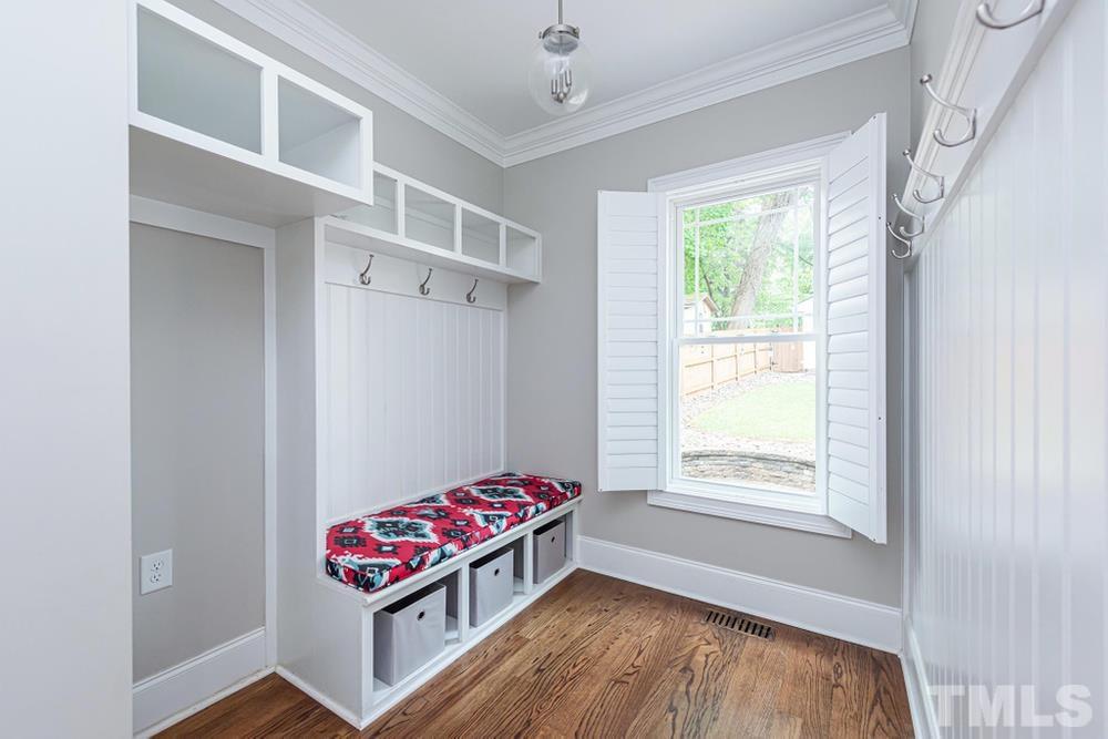 714 Edmund Street Raleigh, NC 27604 - Photo 8 of 30 Mudroom with hardwood floors, lots of natural light, and storage for backpacks, coats, shoes, and more.