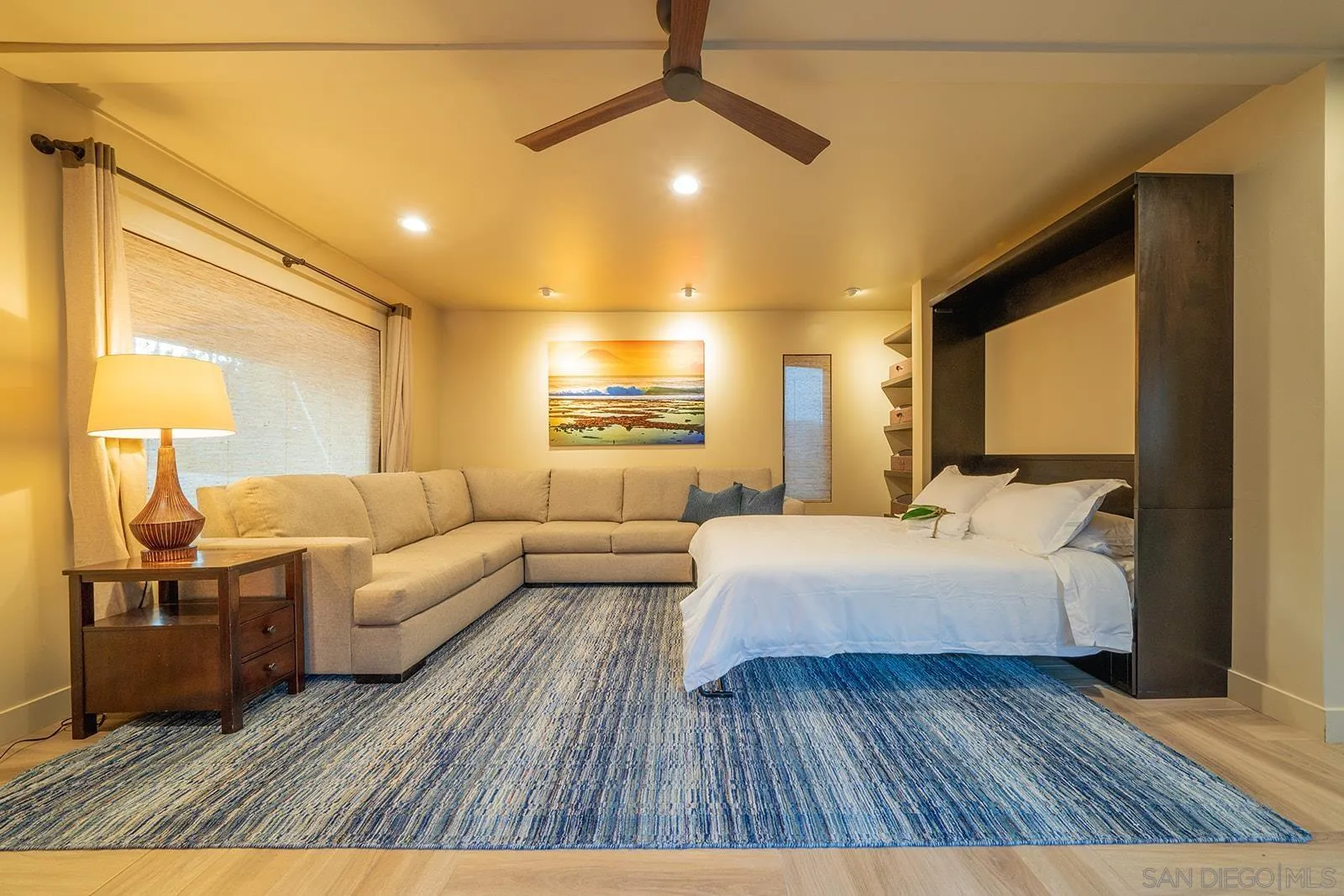 843 Neptune Avenue Encinitas, CA 92024 - Photo 15 of 49 a bedroom with furniture and wooden floor