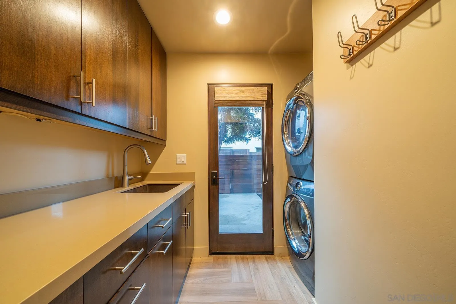 843 Neptune Avenue Encinitas, CA 92024 - Photo 18 of 49 a bathroom with a sink and a mirror