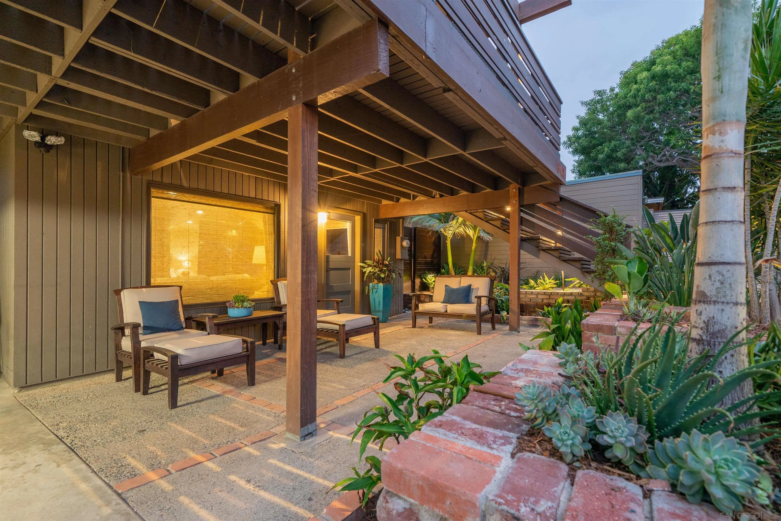 843 Neptune Avenue Encinitas, CA 92024 - Photo 27 of 49 a view of a backyard with garden and patio