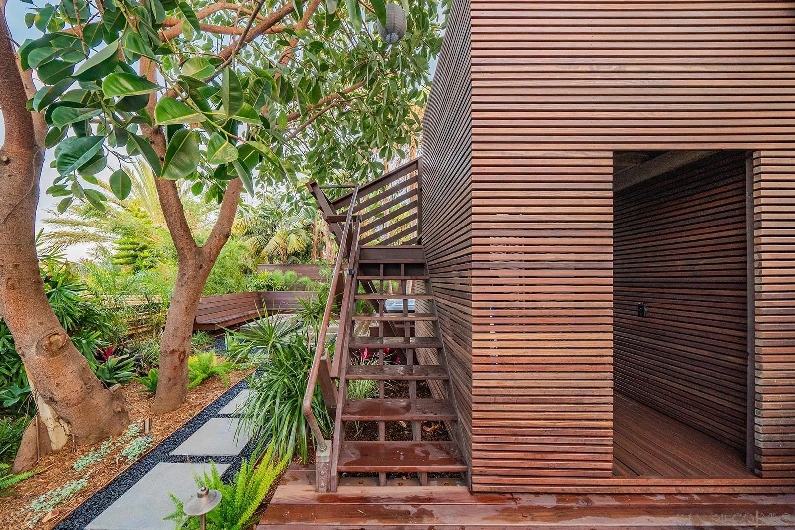 843 Neptune Avenue Encinitas, CA 92024 - Photo 34 of 49 a front view of a house with plants