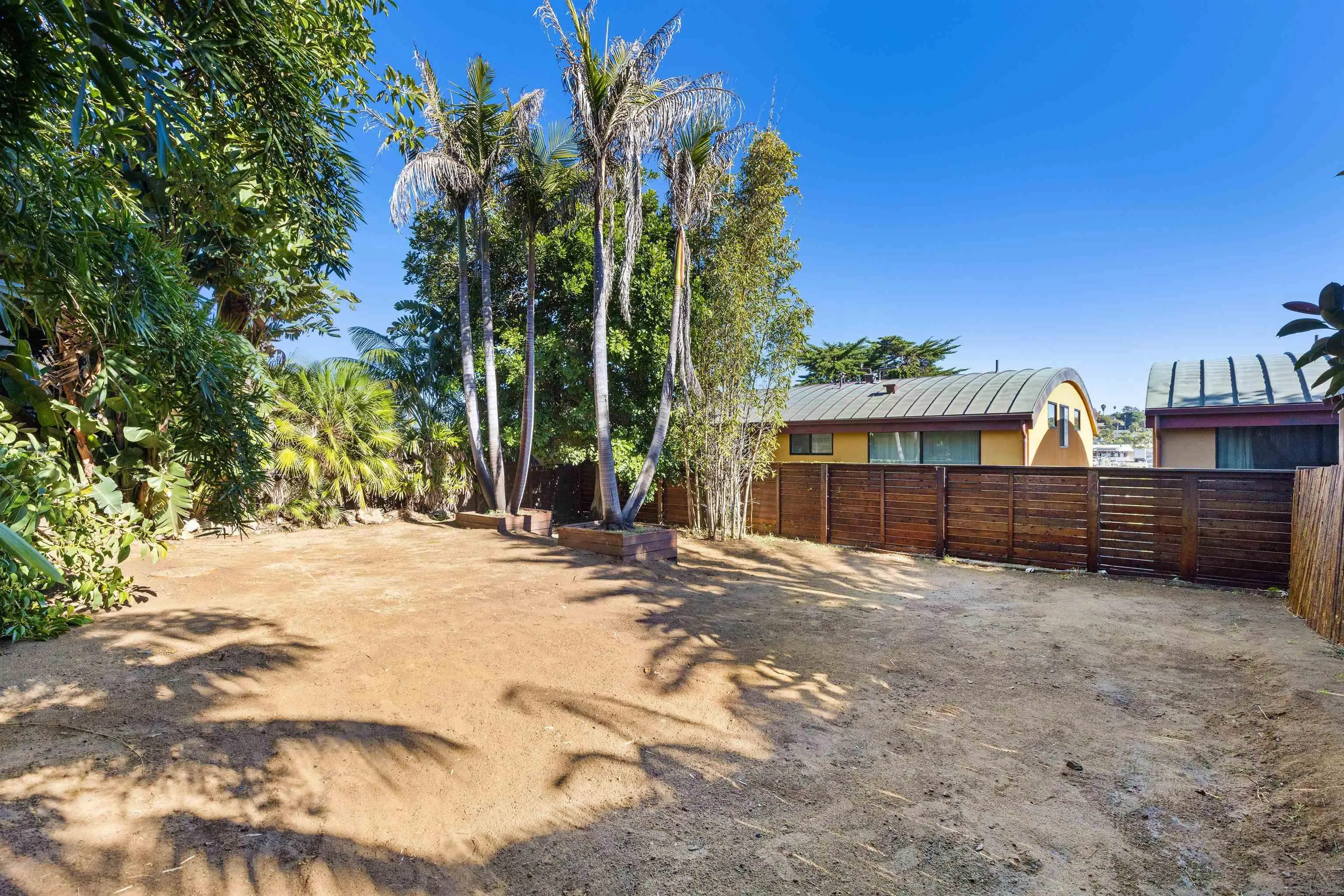 843 Neptune Avenue Encinitas, CA 92024 - Photo 37 of 49 a view of a house with a yard