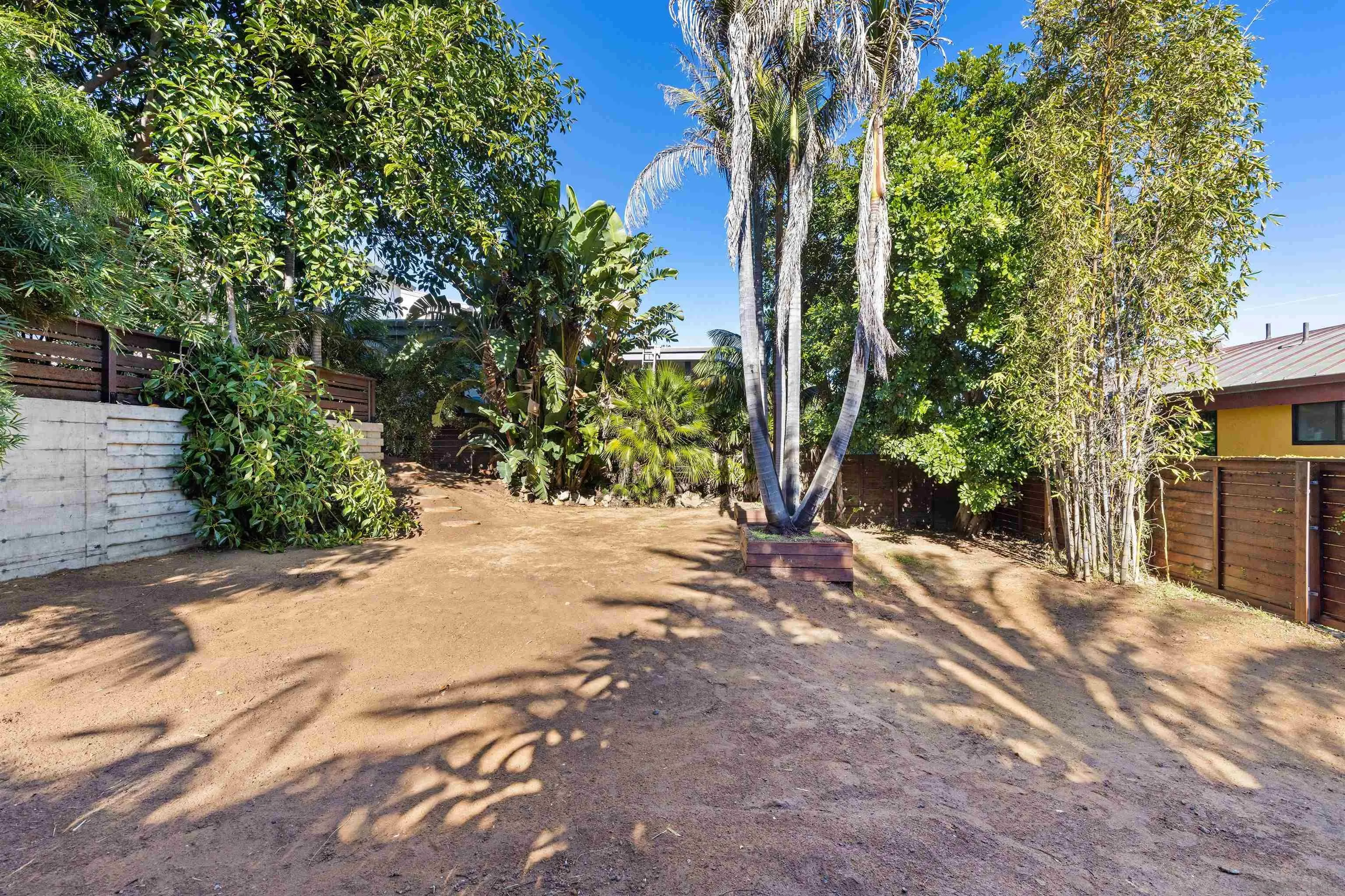 843 Neptune Avenue Encinitas, CA 92024 - Photo 38 of 49 a view of a backyard of a house