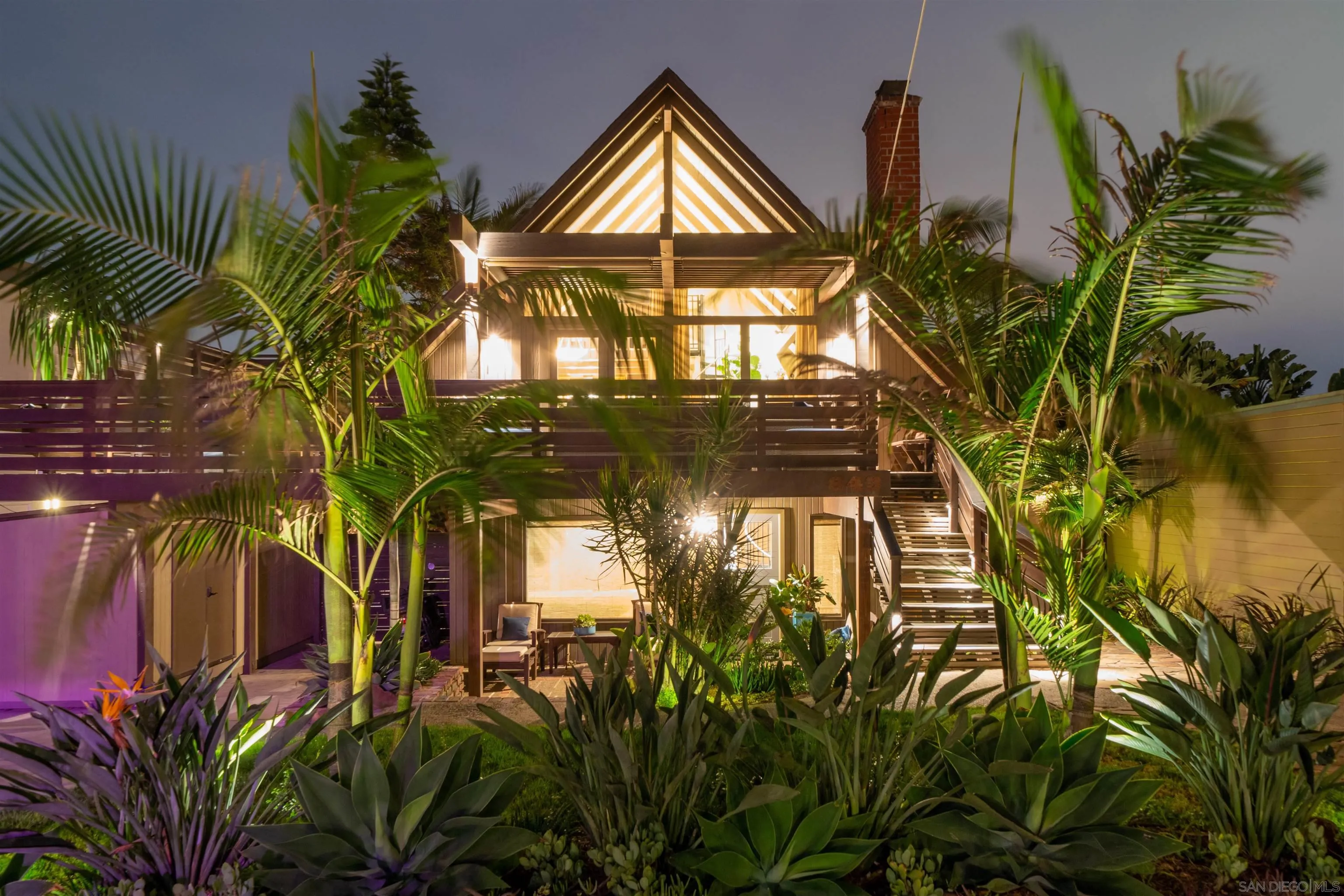 843 Neptune Avenue Encinitas, CA 92024 - Photo 49 of 49 a view of a yard with plants and large trees