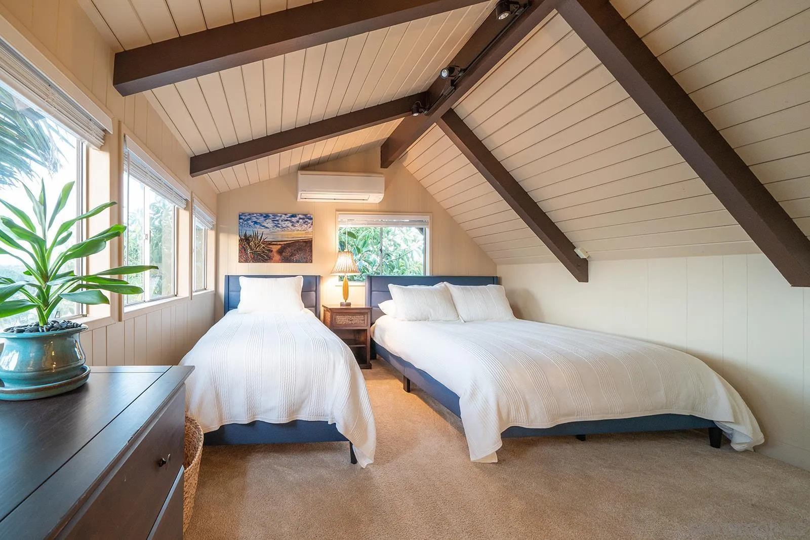 843 Neptune Avenue Encinitas, CA 92024 - Photo 5 of 49 a bedroom with bed and a large window