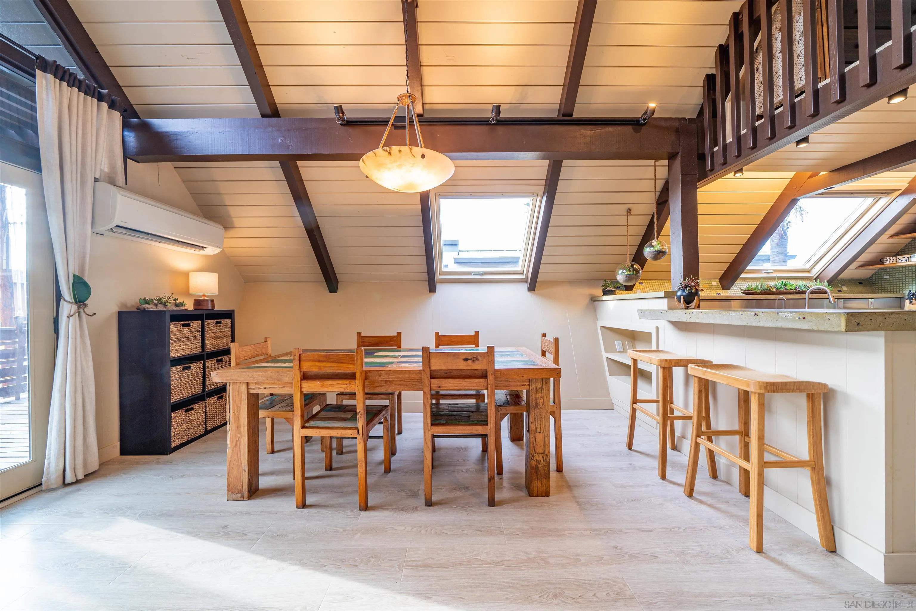 843 Neptune Avenue Encinitas, CA 92024 - Photo 8 of 49 a view of a dining room with furniture