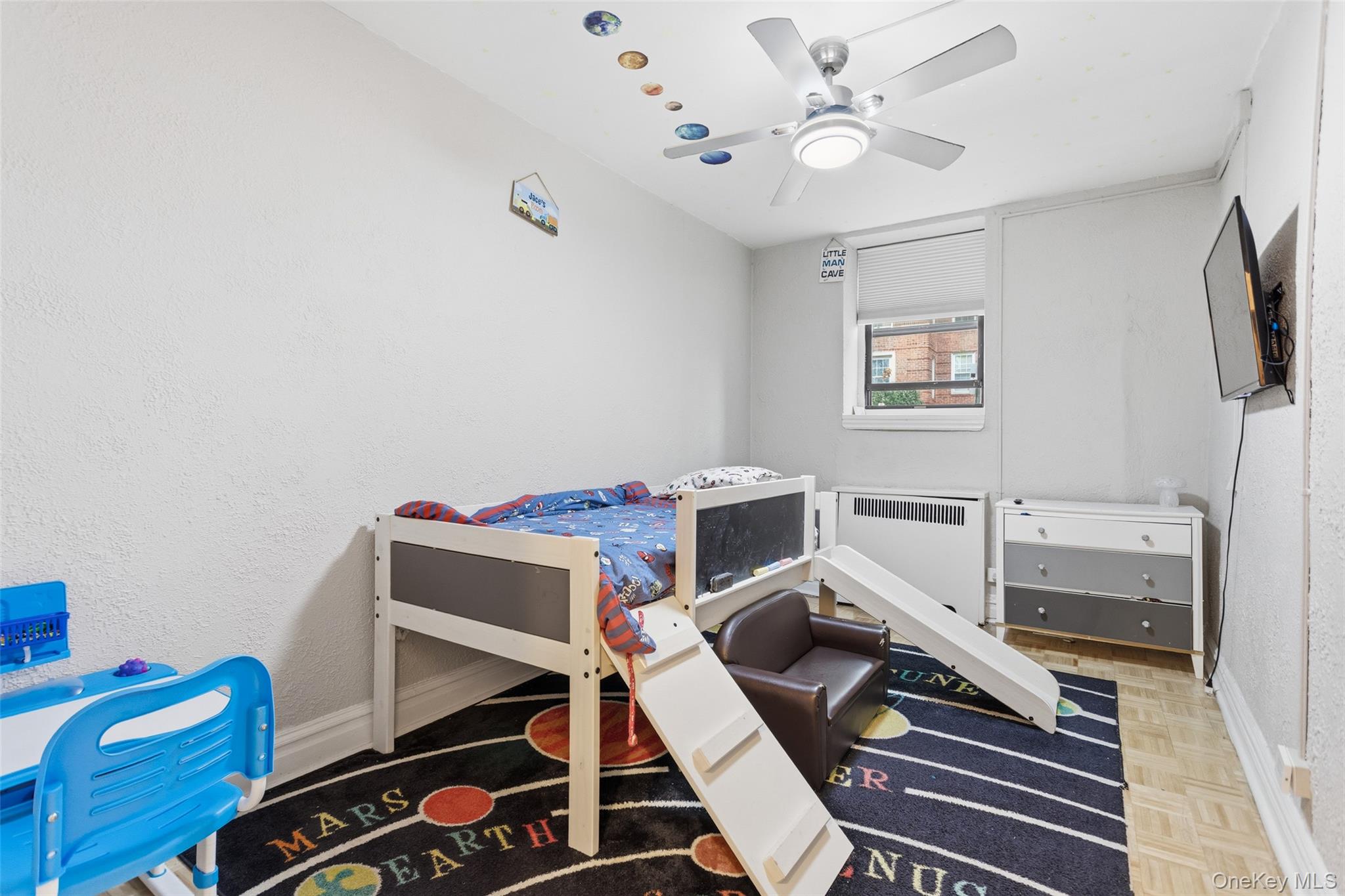30 Clinton Place, Unit LB New Rochelle, NY 10801 - Photo 12 of 17 a workspace with furniture and a window