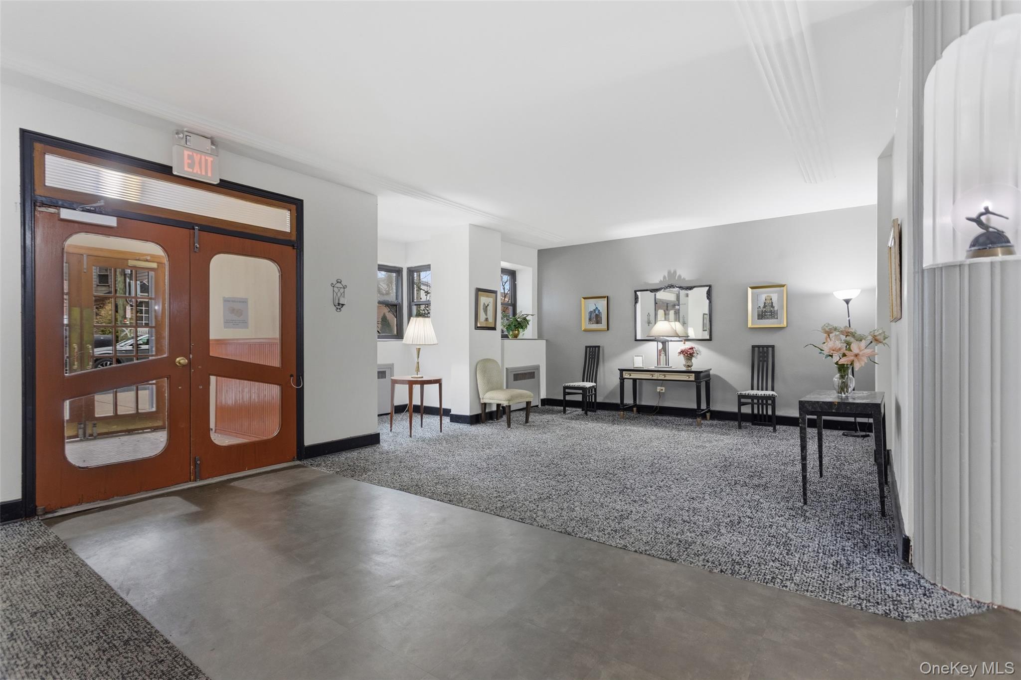 30 Clinton Place, Unit LB New Rochelle, NY 10801 - Photo 13 of 17 a view of a livingroom with furniture and windows