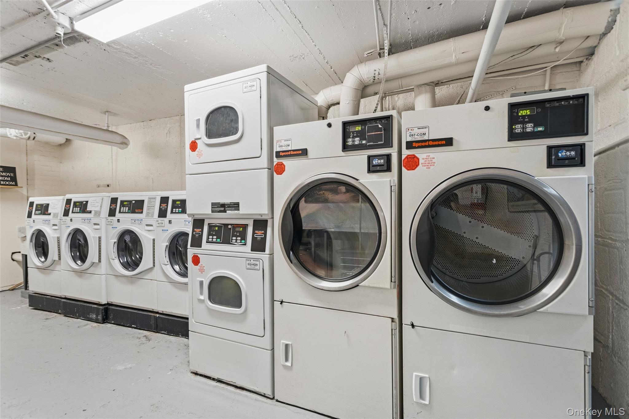 30 Clinton Place, Unit LB New Rochelle, NY 10801 - Photo 15 of 17 a utility room with dryer and washer