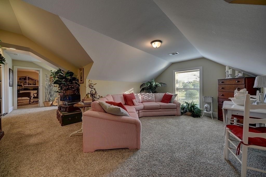 8456 Schuster Road Ledbetter, TX 78946 - Photo 28 of 49 a living room with furniture and a flat screen tv