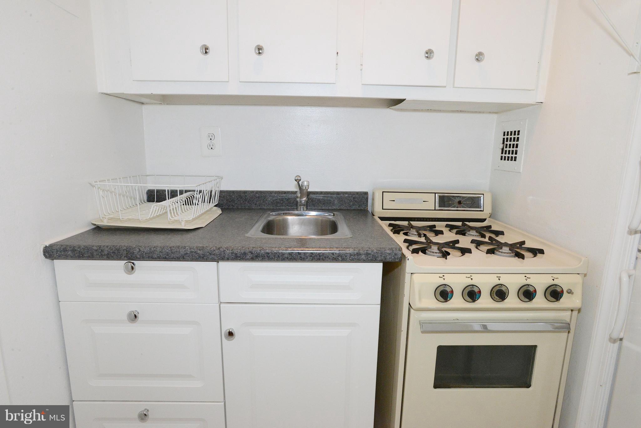 1021 Arlington Boulevard, Unit 336 Arlington, VA 22209 - Photo 10 of 25 Kitchen EXTRA CABINETS & DRAWERS