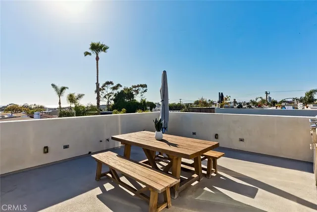 a view of a terrace with furniture