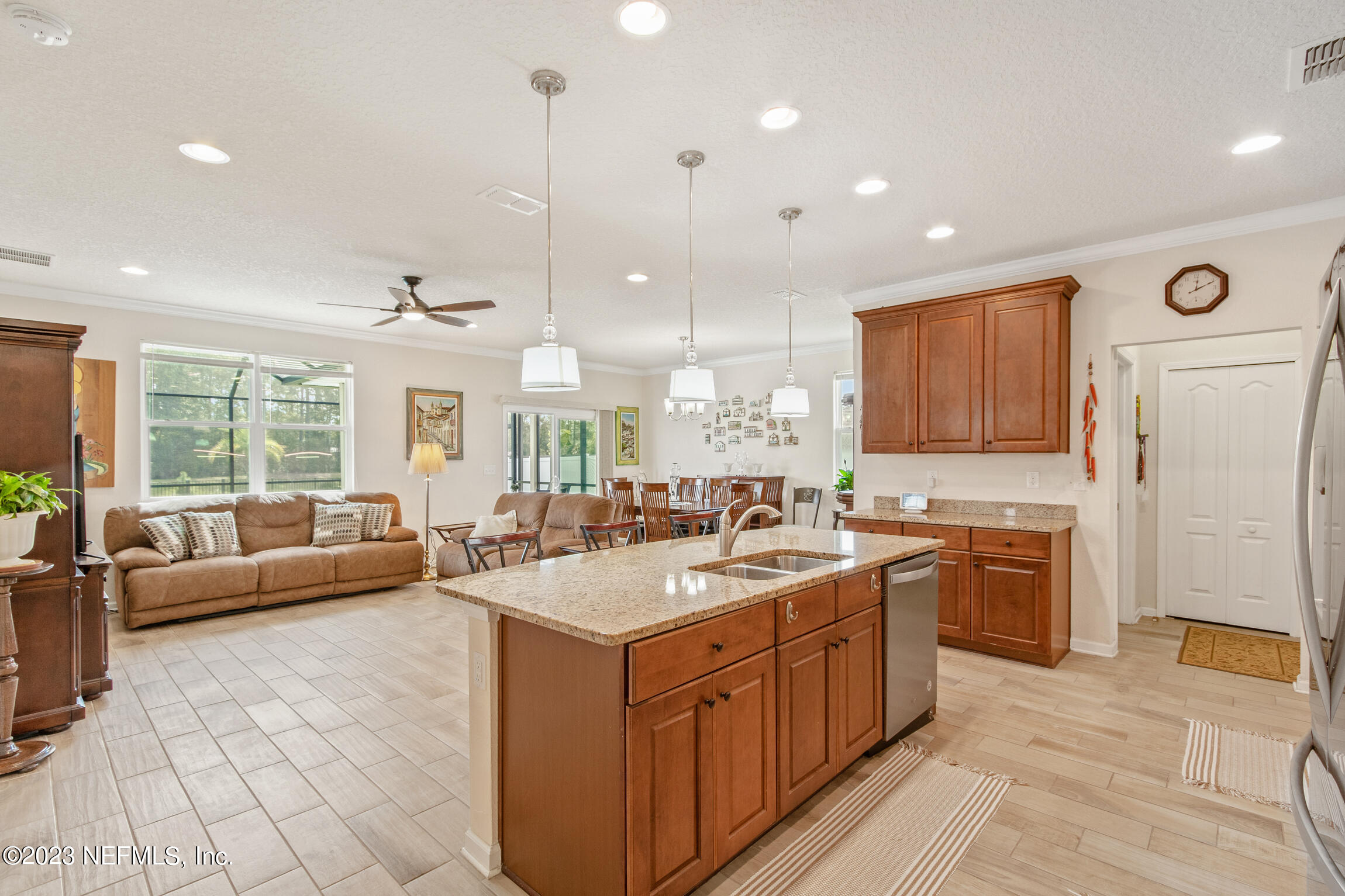 57 Deer Crossing Road St. Augustine, FL 32086 - Photo 8 of 48 a kitchen with a sink stove and refrigerator