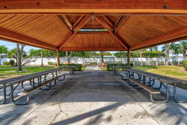 a view of a park with sitting area