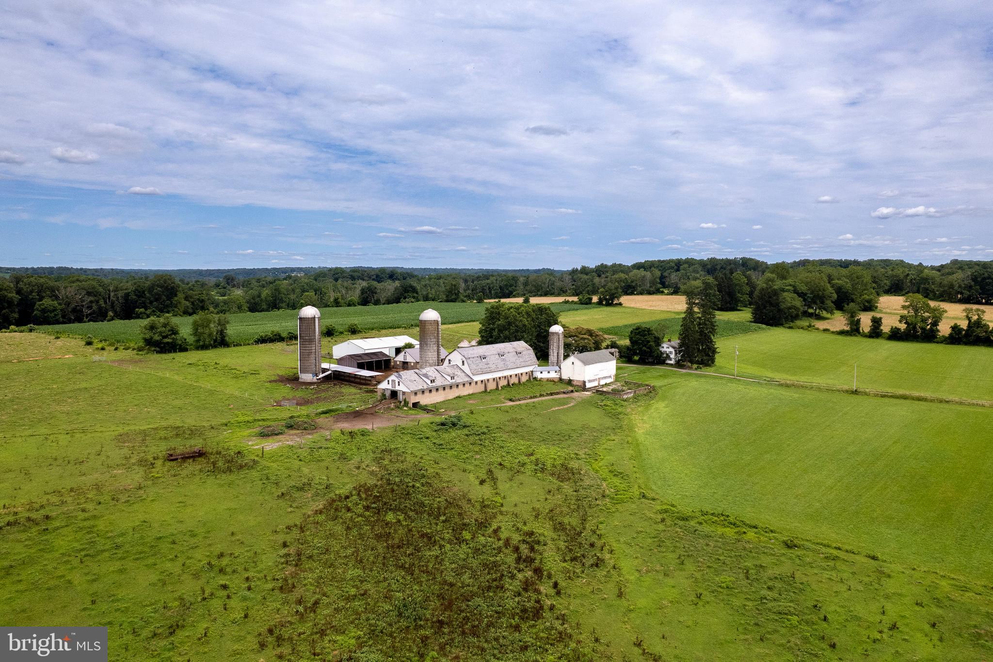 960 Sergeantsville Road Stockton, NJ 08559 - Photo 11 of 26 a backyard of a house with table and chairs