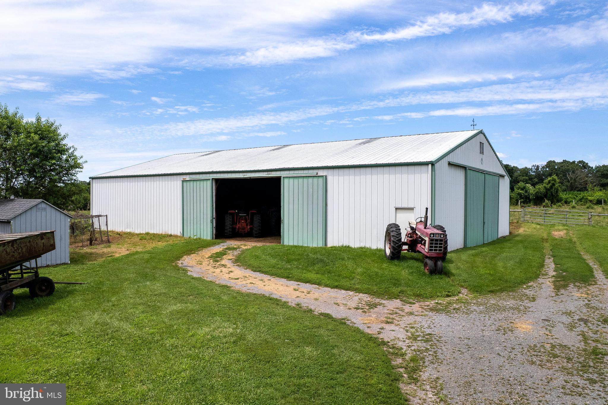 960 Sergeantsville Road Stockton, NJ 08559 - Photo 14 of 26 a view of a backyard with couches and garage