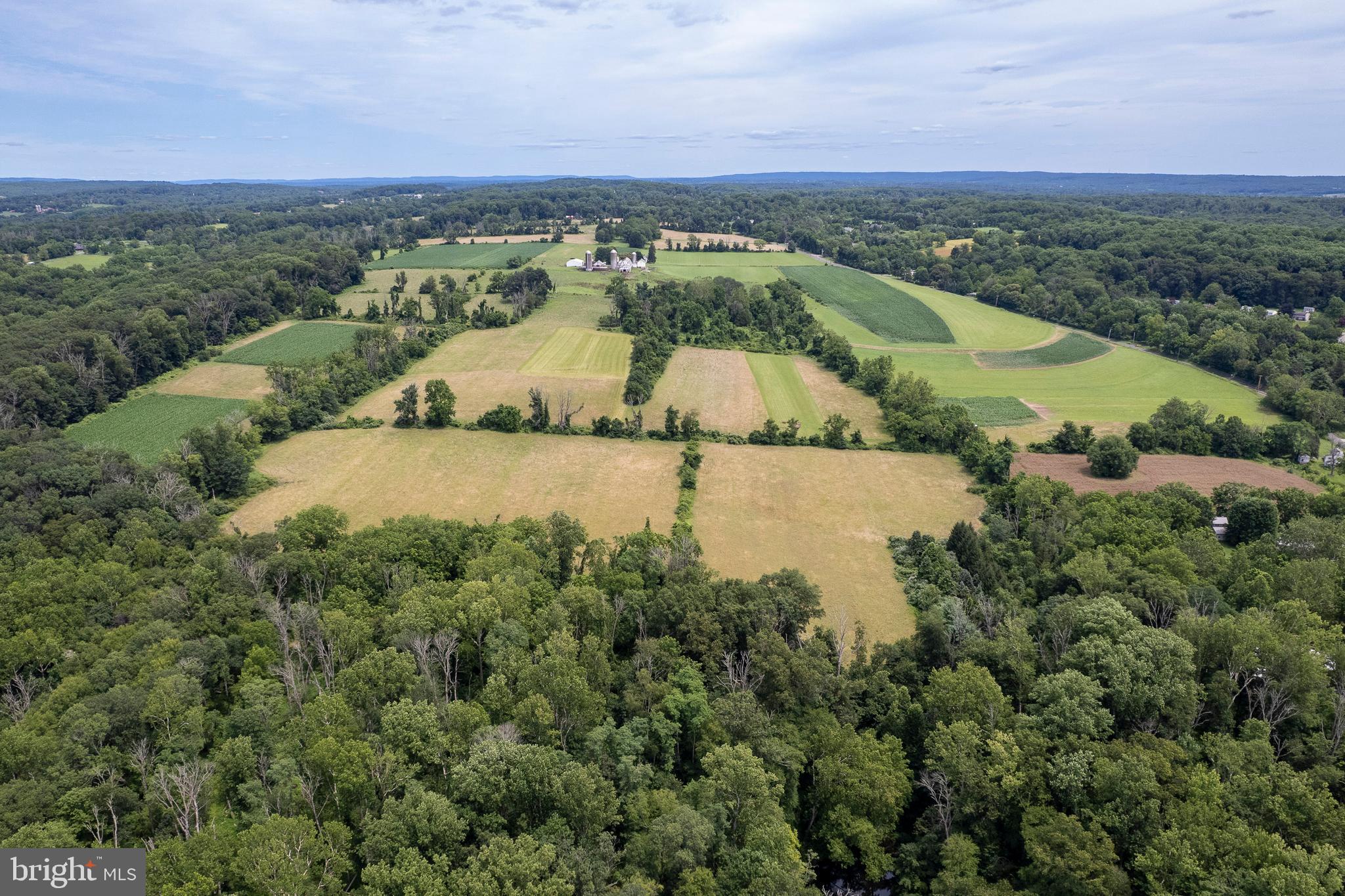 960 Sergeantsville Road Stockton, NJ 08559 - Photo 20 of 26 an aerial view of residential houses with outdoor space and river