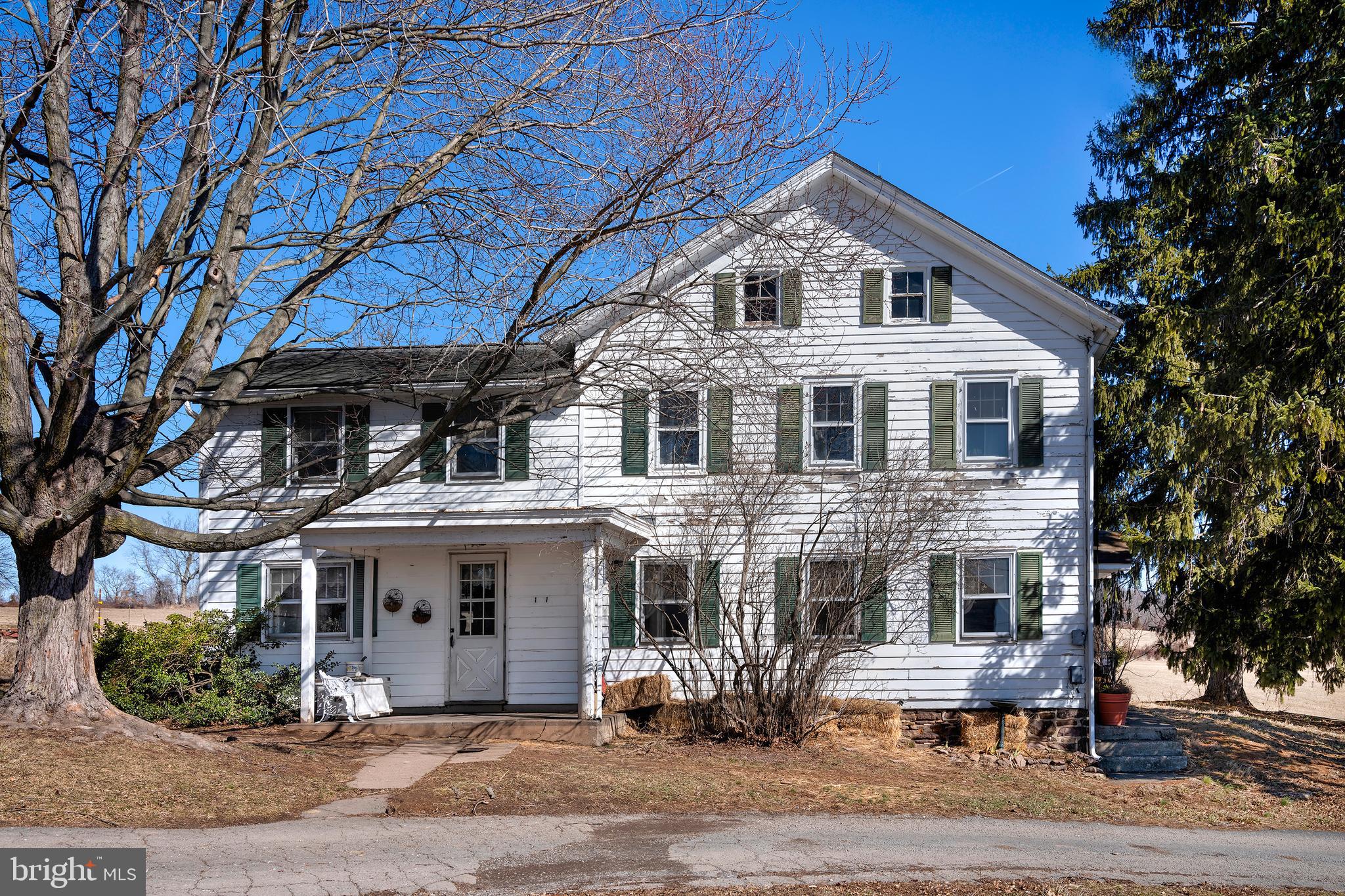 960 Sergeantsville Road Stockton, NJ 08559 - Photo 3 of 26 a front view of a house with a yard