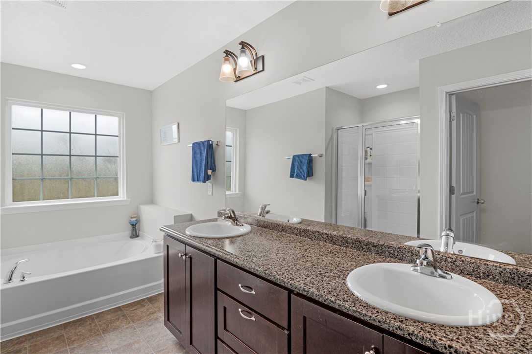 223 Rutledge Drive Hinesville, GA 31313 - Photo 18 of 35 Primary suite bath with soaking tub, double vanities and walk-in shower