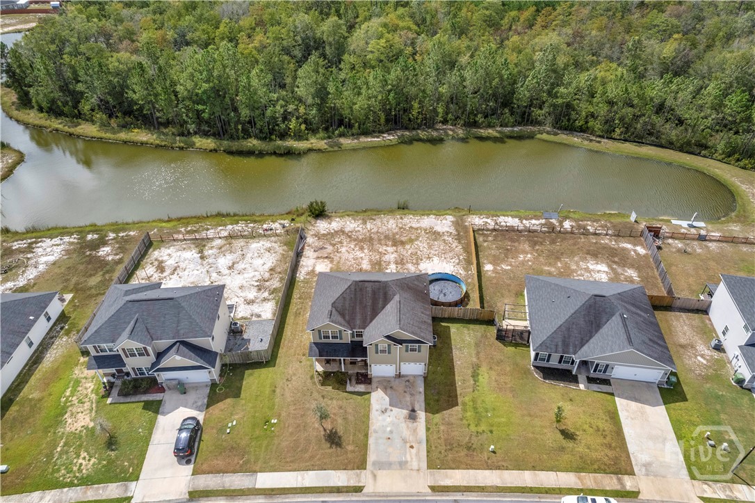 223 Rutledge Drive Hinesville, GA 31313 - Photo 34 of 35 LARGE .54 acre lot includes pond and small area on the other side.