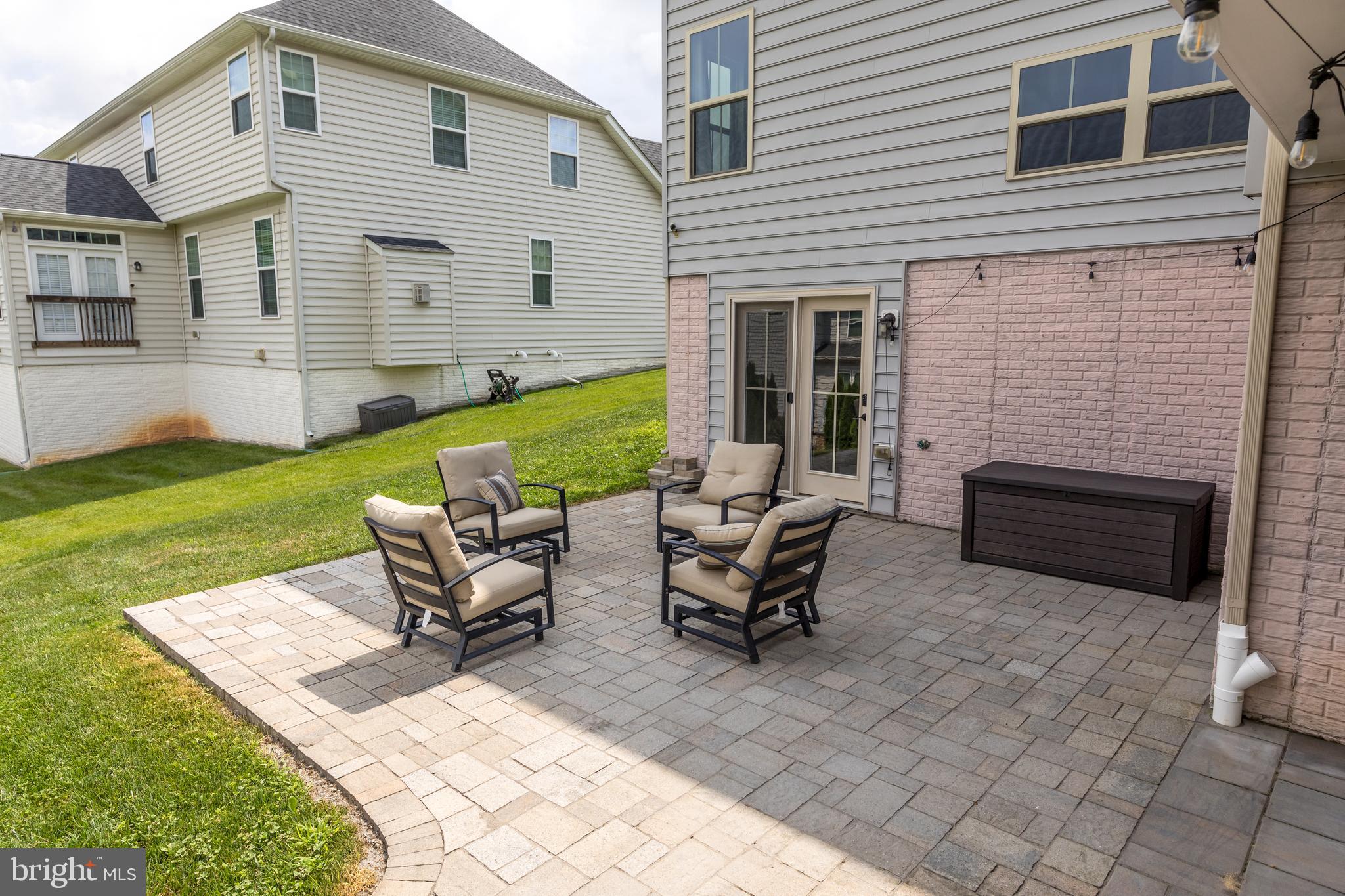 10415 Windlass Run Road Baltimore, MD 21220 - Photo 46 of 52 a view of a house with backyard and sitting area