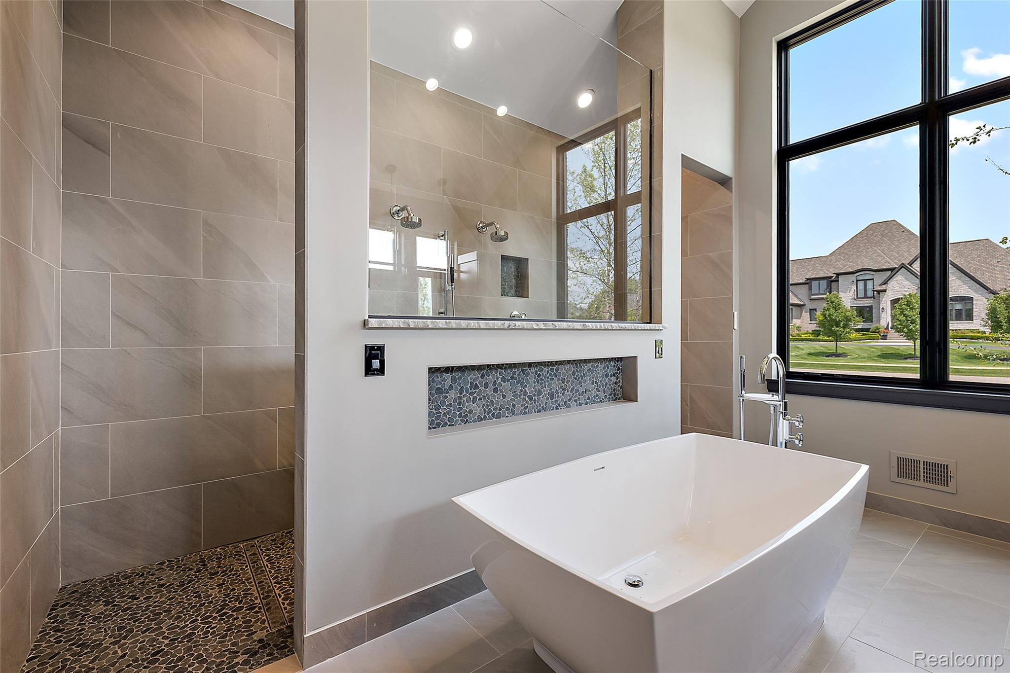 5541 Bordman Road Dryden, MI 48428 - Photo 14 of 27 Bathroom with a soaking tub and walk in shower