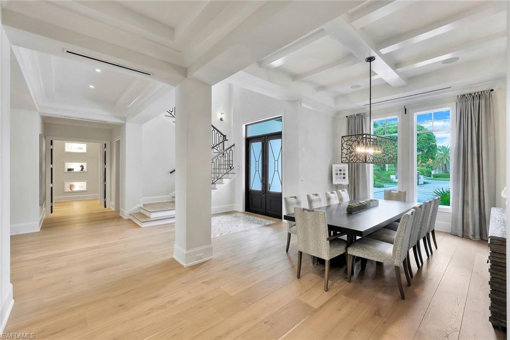 850 Nelson`s Walk Naples, FL 34102 - Photo 25 of 47 a view of a dining room with furniture and wooden floor