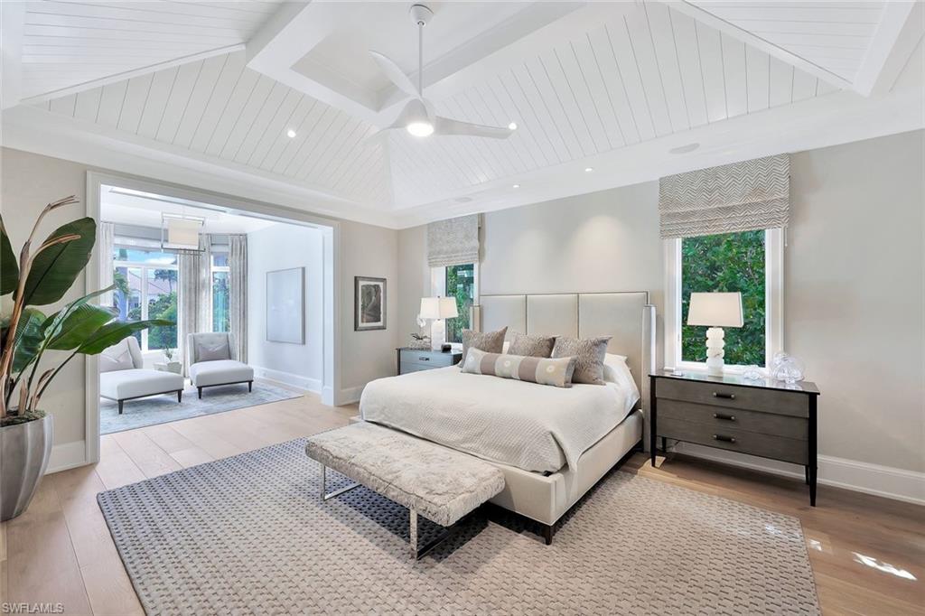 850 Nelson`s Walk Naples, FL 34102 - Photo 27 of 47 a bedroom with a large bed and a couch
