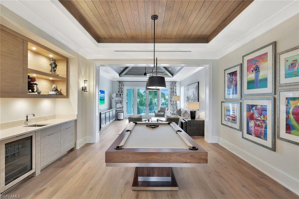 850 Nelson`s Walk Naples, FL 34102 - Photo 31 of 47 a view of a dining room with furniture window and wooden floor