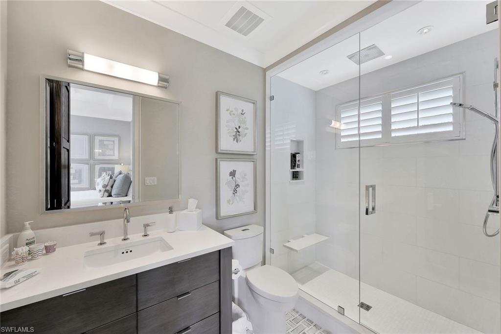 850 Nelson`s Walk Naples, FL 34102 - Photo 39 of 47 a bathroom with a sink a toilet and shower