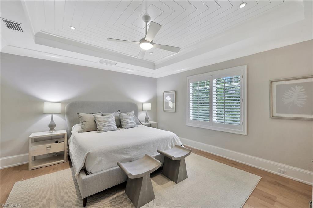 850 Nelson`s Walk Naples, FL 34102 - Photo 40 of 47 a bedroom with a bed and a table