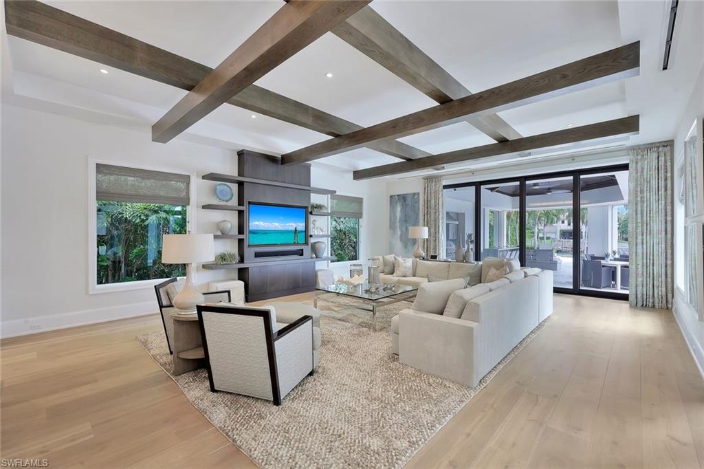 850 Nelson`s Walk Naples, FL 34102 - Photo 9 of 47 a living room with furniture and a large window