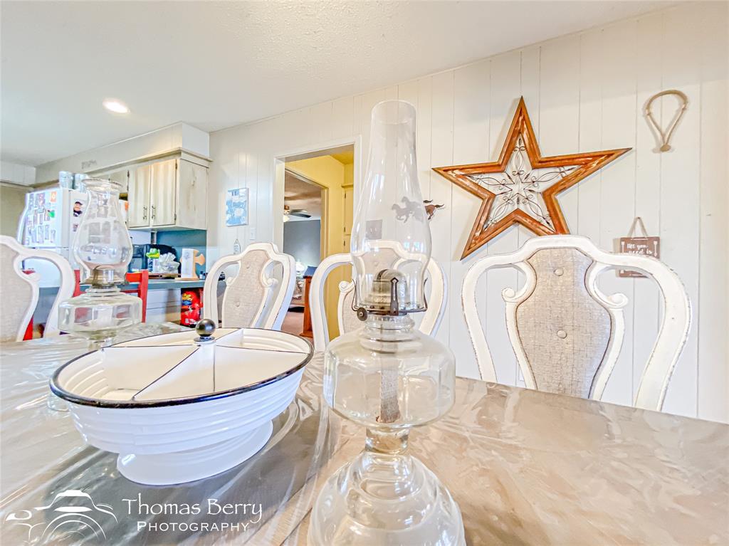 2732 County Road 248 Snyder, TX 79549 - Photo 11 of 31 a dining room with table and chairs