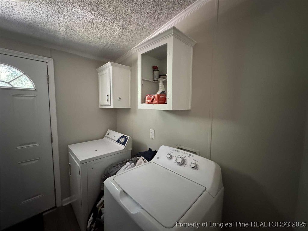 212 Grummen Road Hope Mills, NC 28348 - Photo 8 of 14 a utility room with dryer and washer