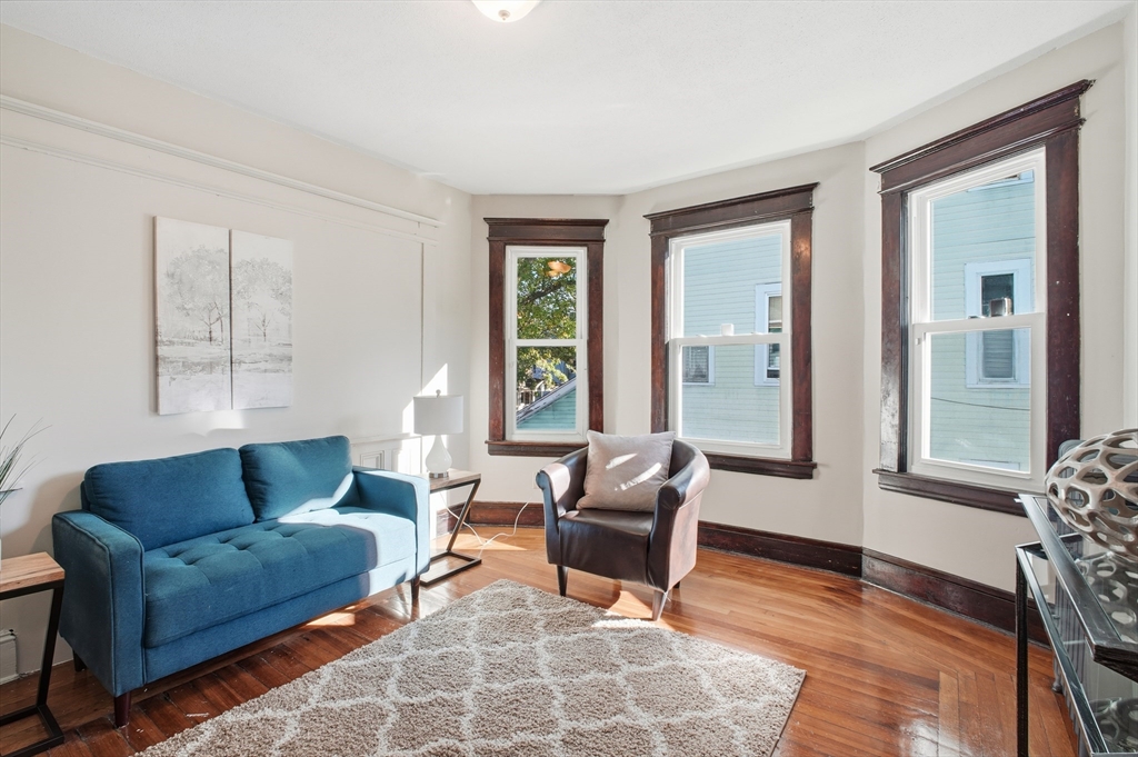 51-53 Abbe Avenue Springfield, MA 01107 - Photo 22 of 42 a living room with furniture and a window