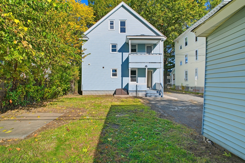 51-53 Abbe Avenue Springfield, MA 01107 - Photo 42 of 42 a front view of house with yard
