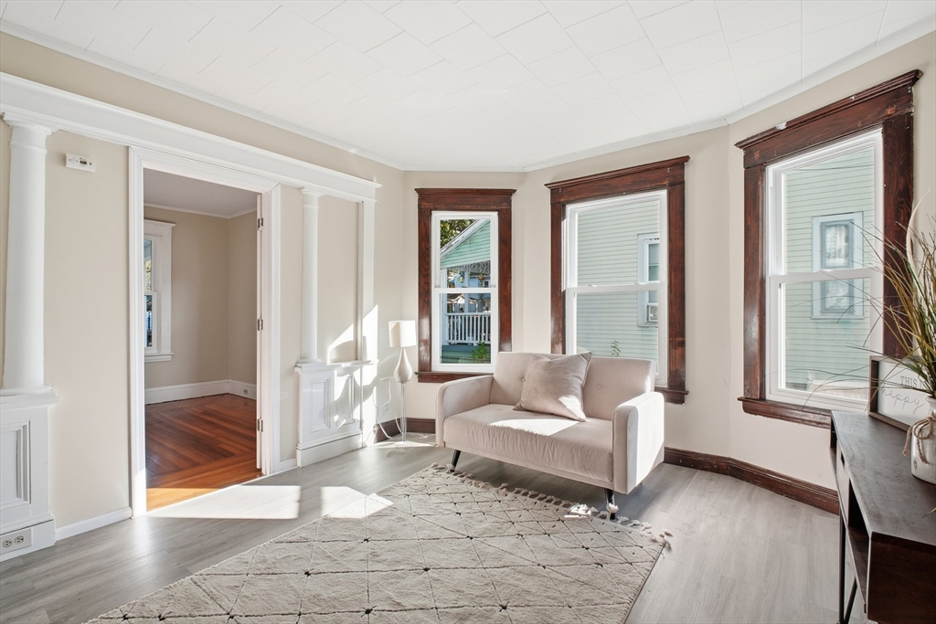 51-53 Abbe Avenue Springfield, MA 01107 - Photo 5 of 42 a living room with furniture and a window